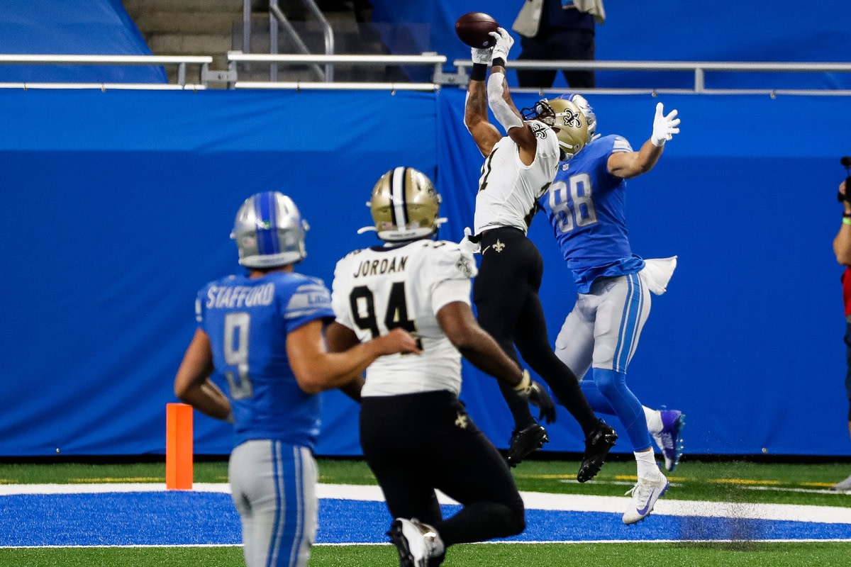 New Orleans Saints cornerback Patrick Robinson intercepts the pass intended for Detroit Lions tight end T.J. Hockenson. © Junfu Han via Imagn Content Services, LLC